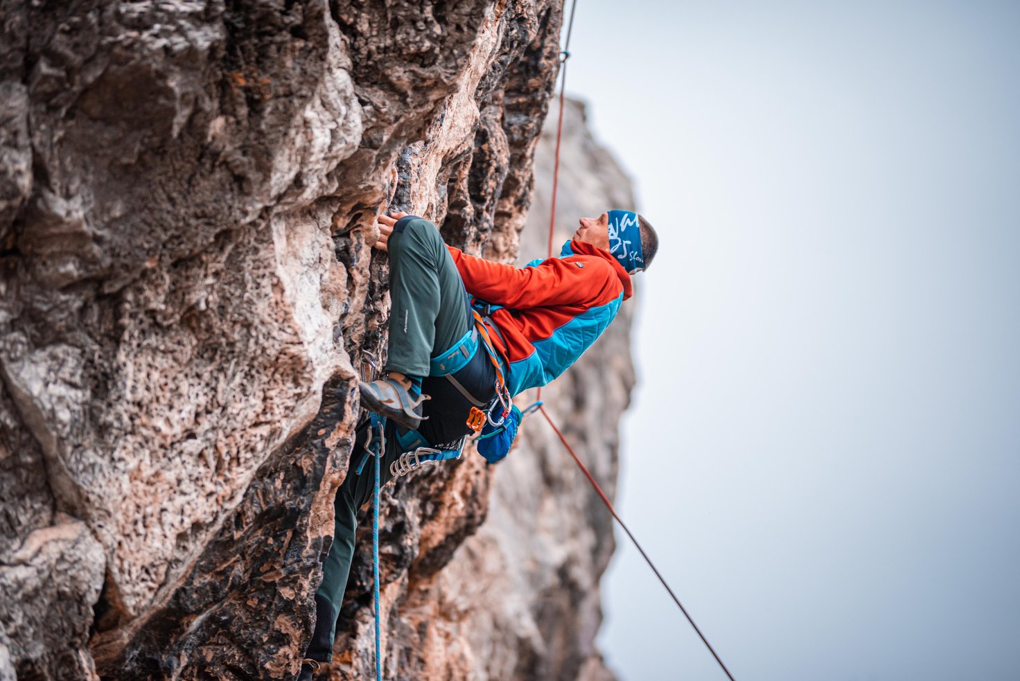 Man Climbing a Rock Mountain